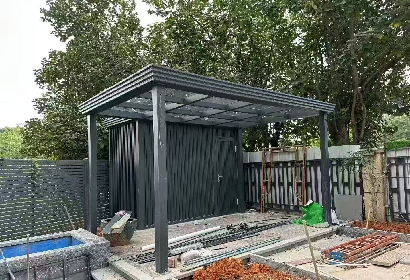 Black aluminum gazebo with courtyard installation