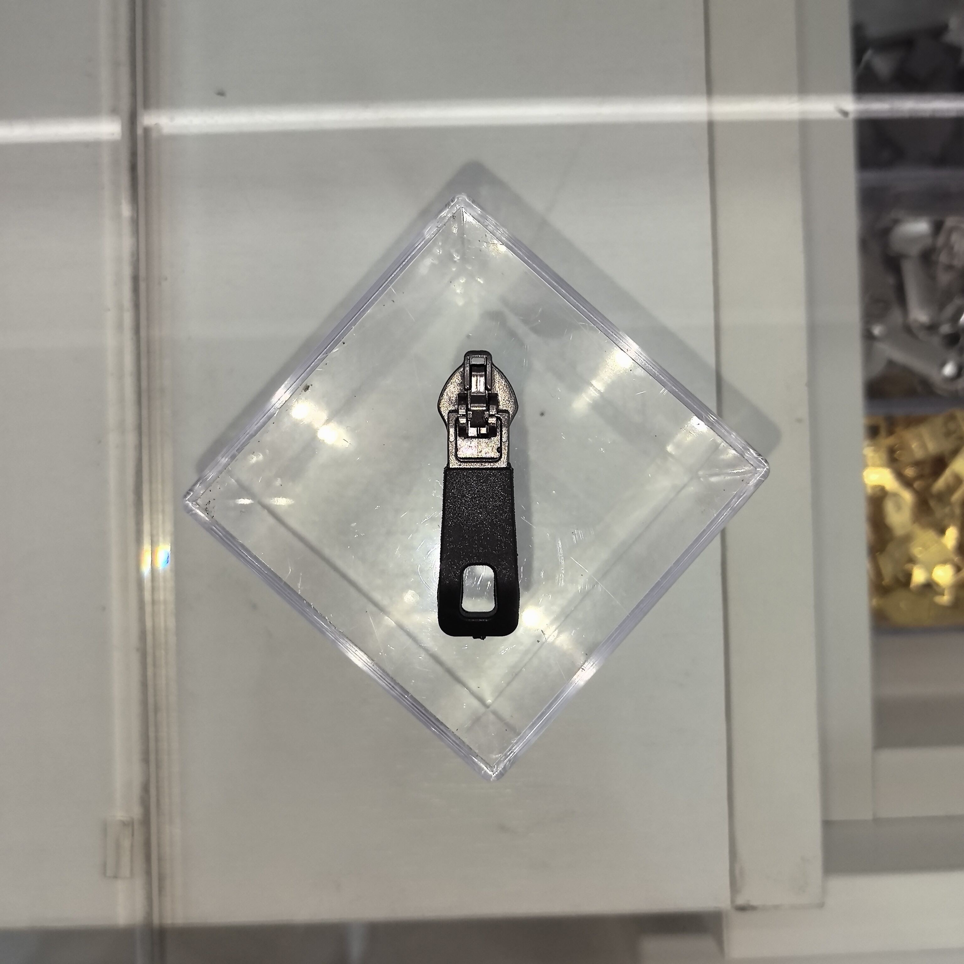 Black square pull tab