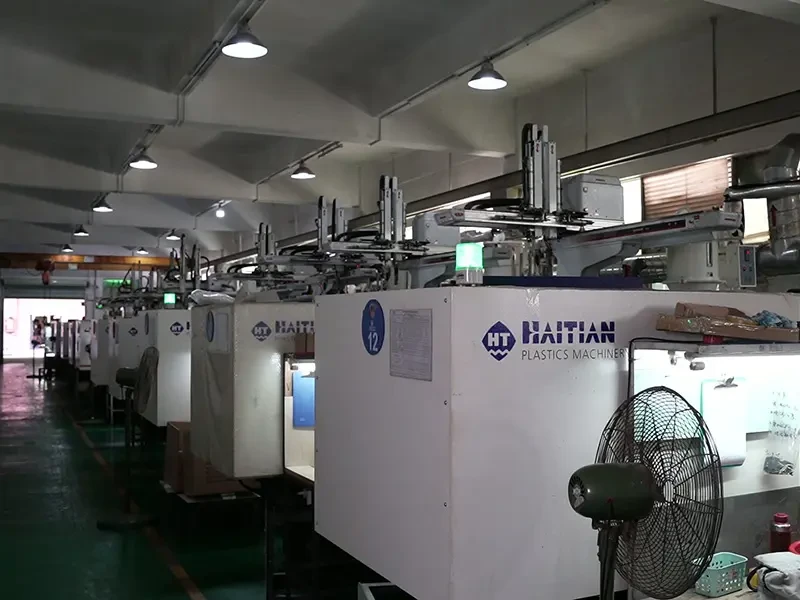 CNC machining center cutting metal in the workshop
