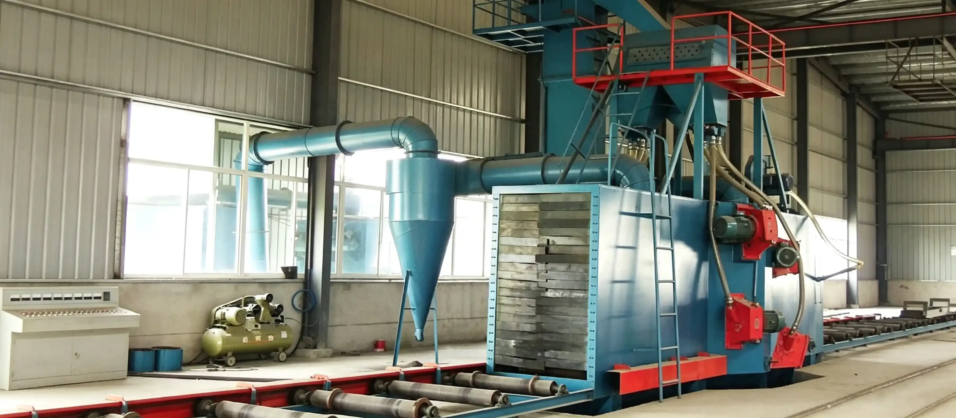 Introduction of roller conveyor pass-through shot blasting machine for steel surface descaling & pretreatment