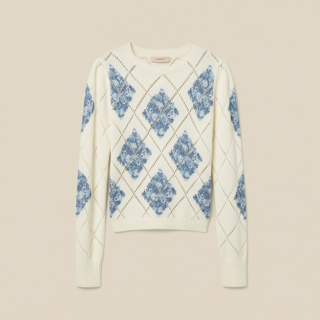 Diamond pattern jumper with floral print
