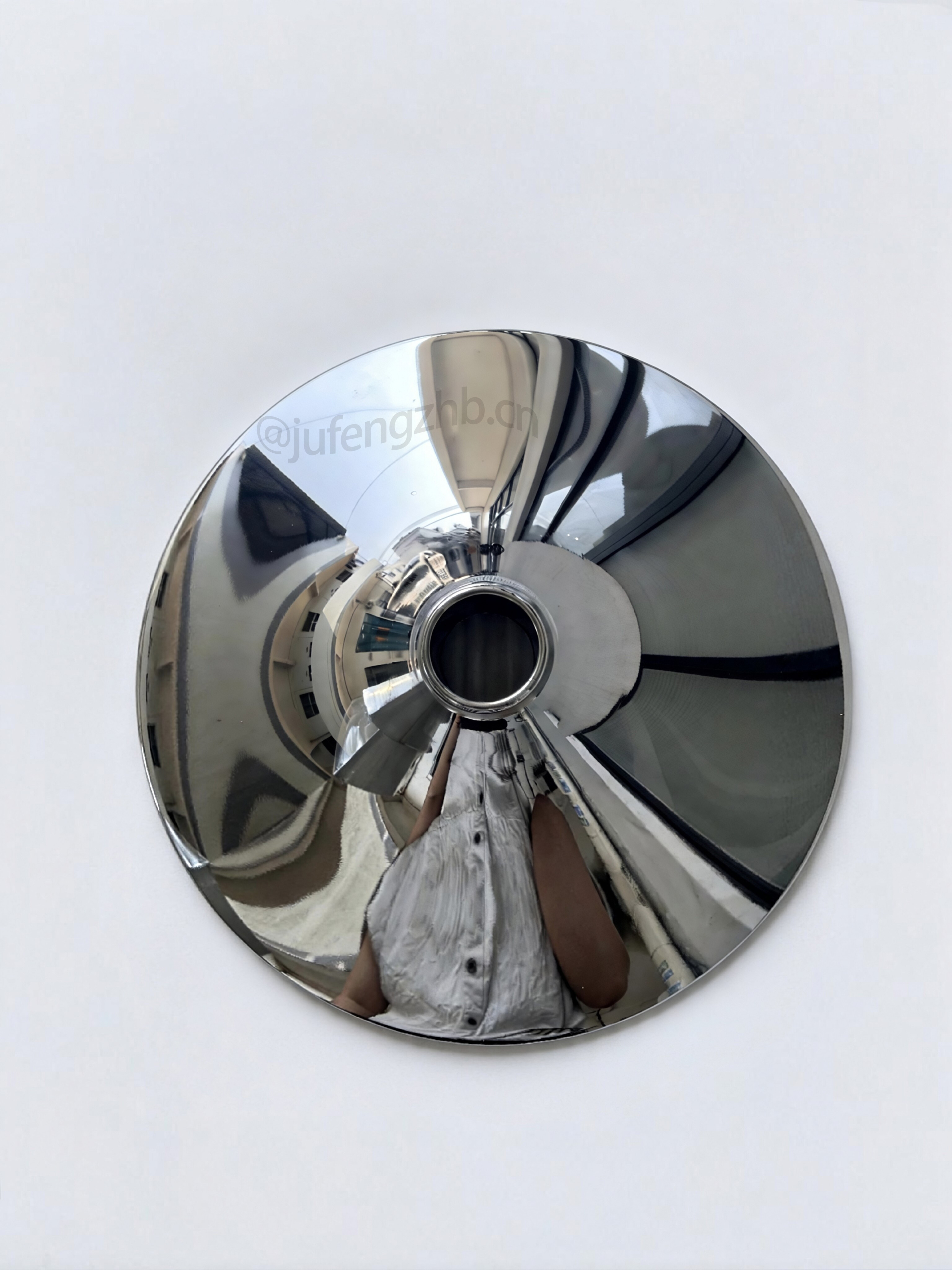 Stainless steel workpiece, dry vibratory polished to 8K mirror finish