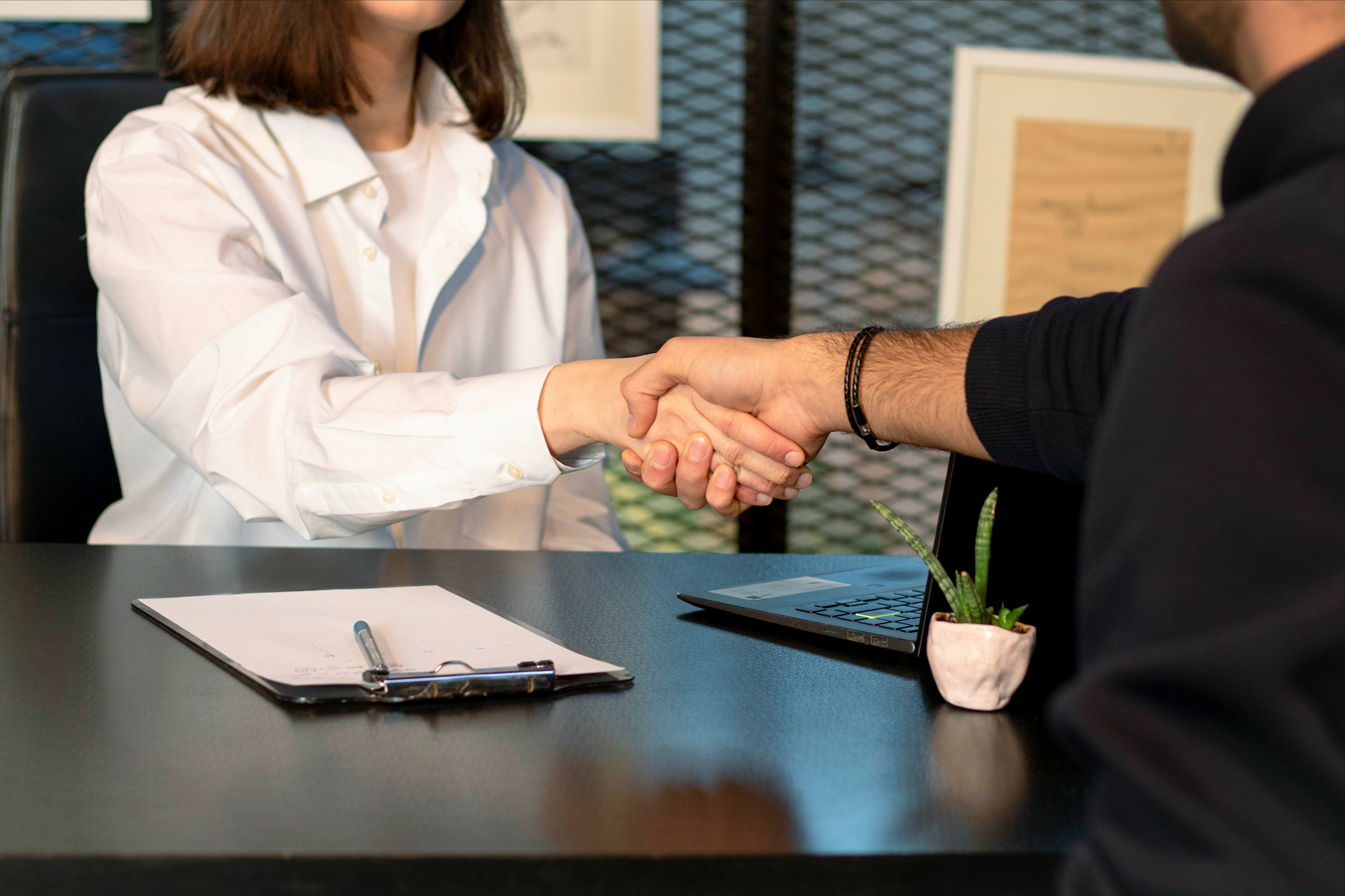 Business handshake cooperation signing