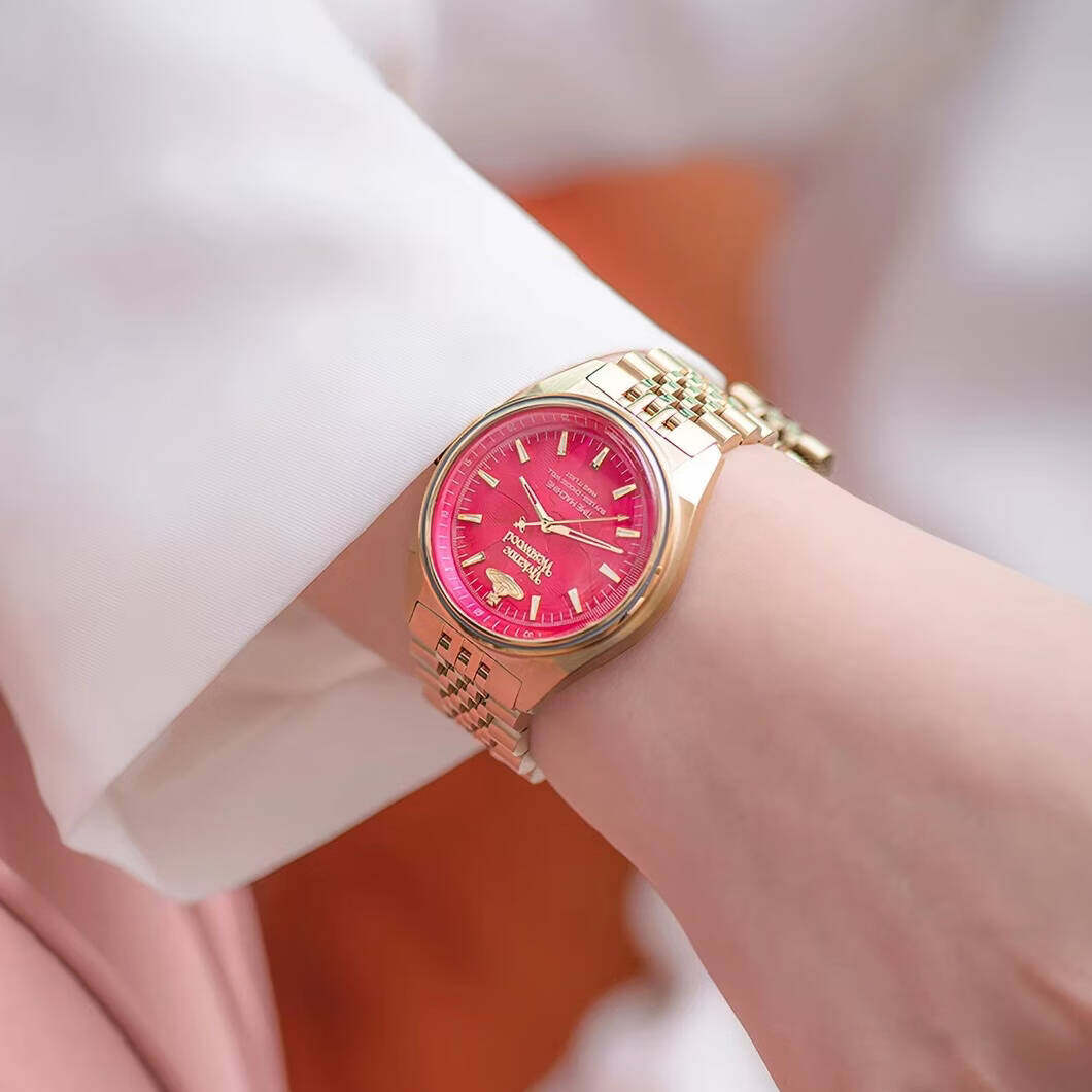 Vivienne Westwood gold watch with red dial