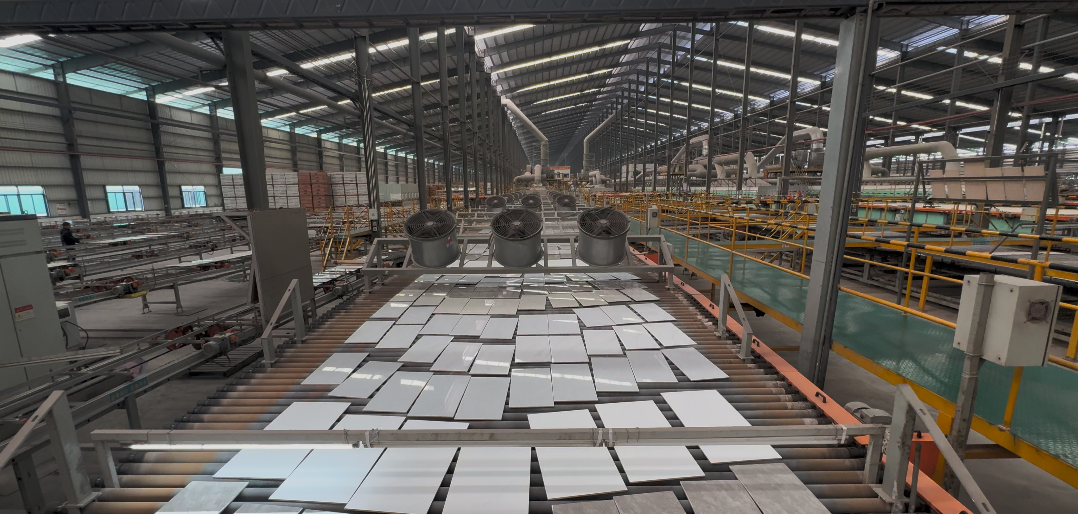 Factory production line with tile conveyor system