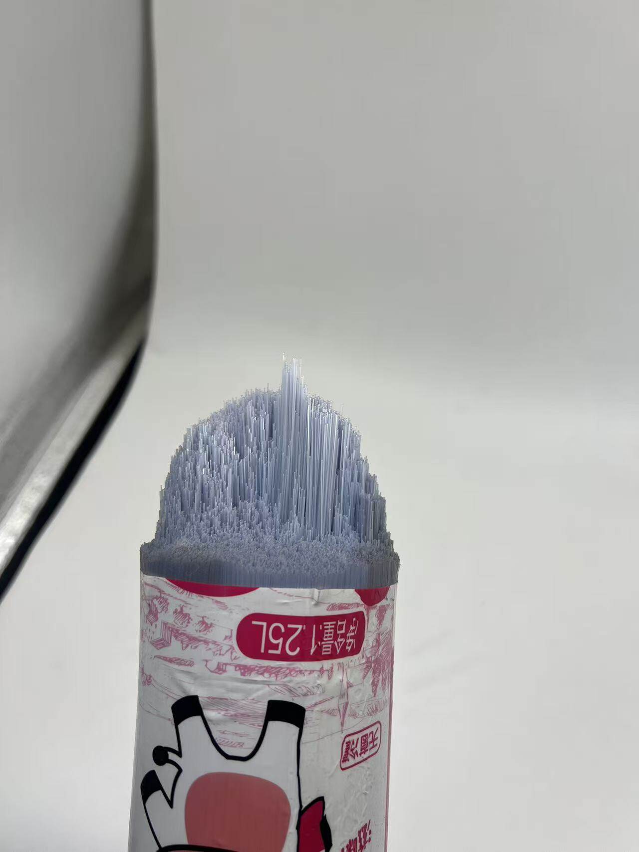 Gray plastic bristle broom head