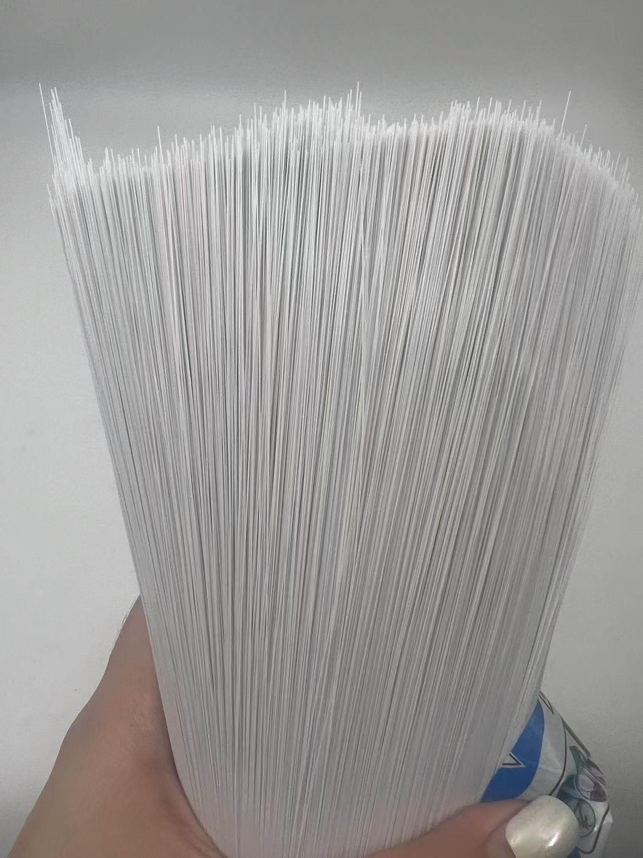 White plastic filament broom head