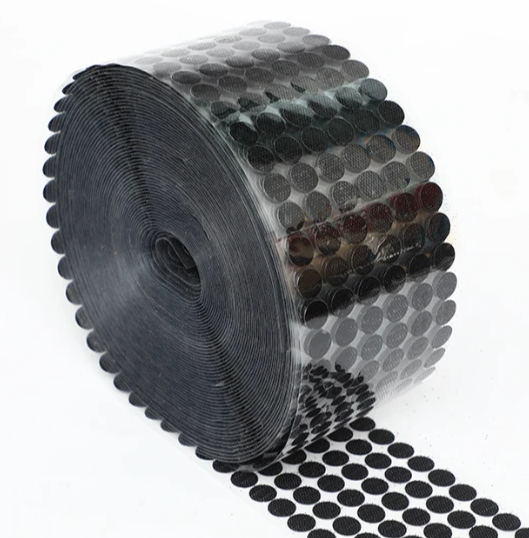 Adhesive-backed dot hook-and-loop fasteners