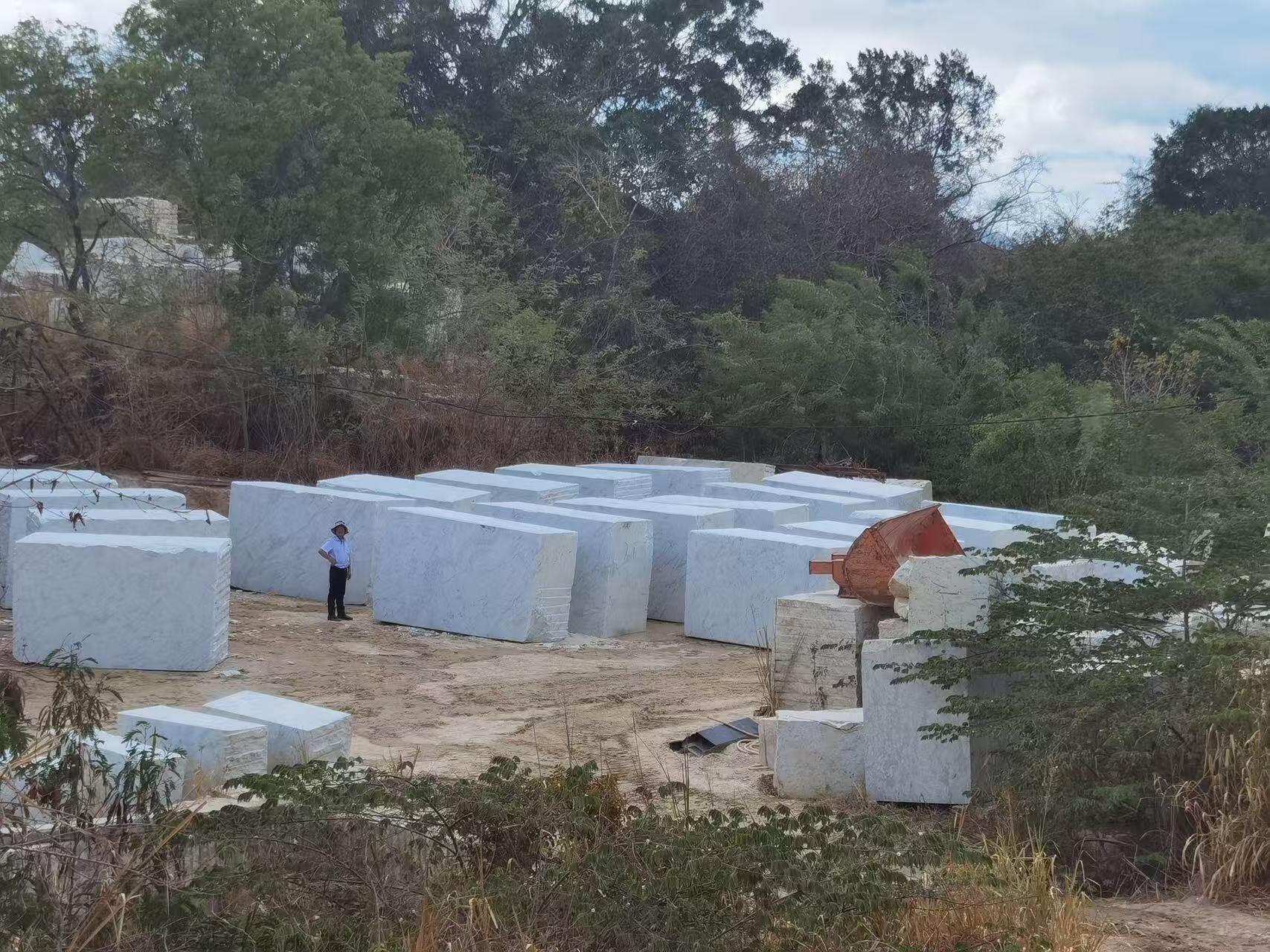 old andromeda white granite blocks
