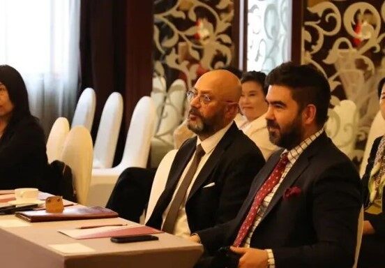 Guests listening at the event