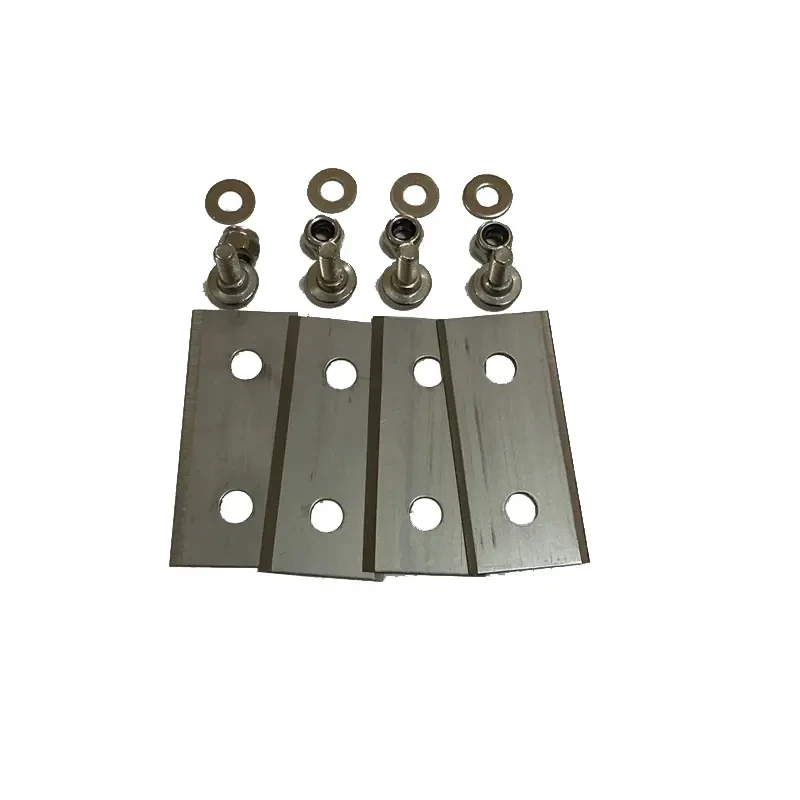 Replacement mower blades, boundary wire and connectors laid out as a service kit
