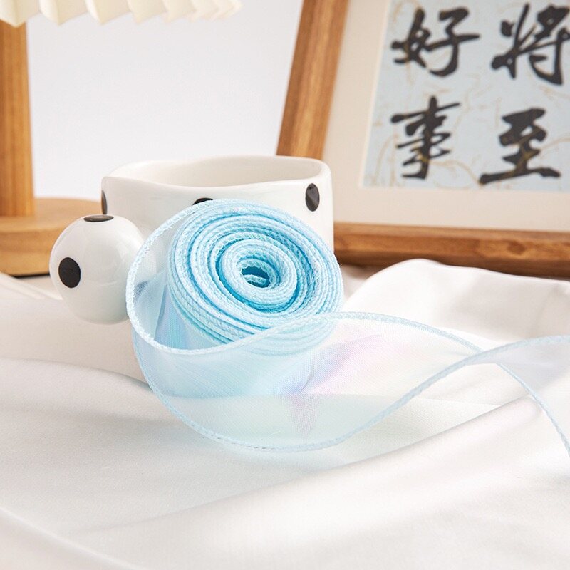 Flowing bordered chiffon ribbon