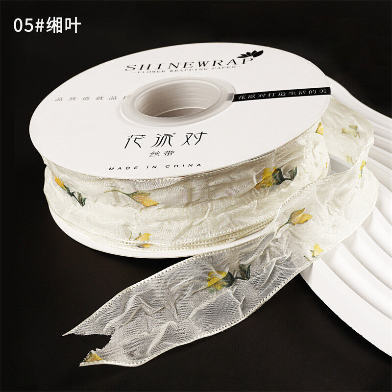 Flowing lace ribbon view 6