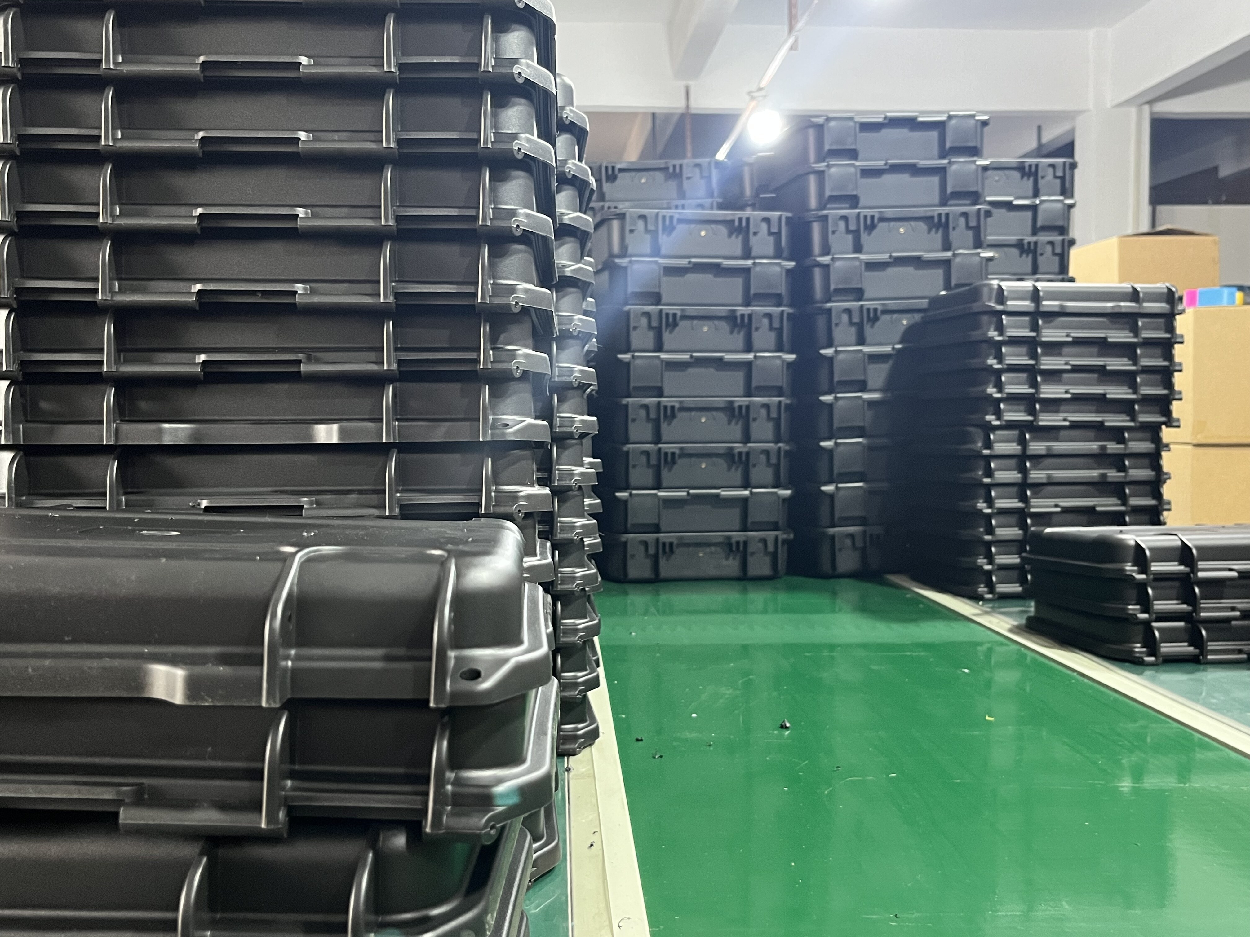 Stacks of finished waterproof cases in warehouse