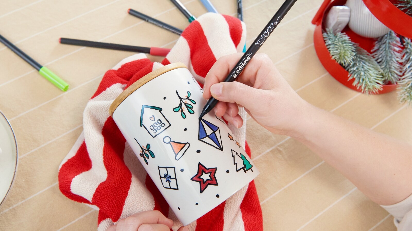 Hand-painted porcelain biscuit tin and mug