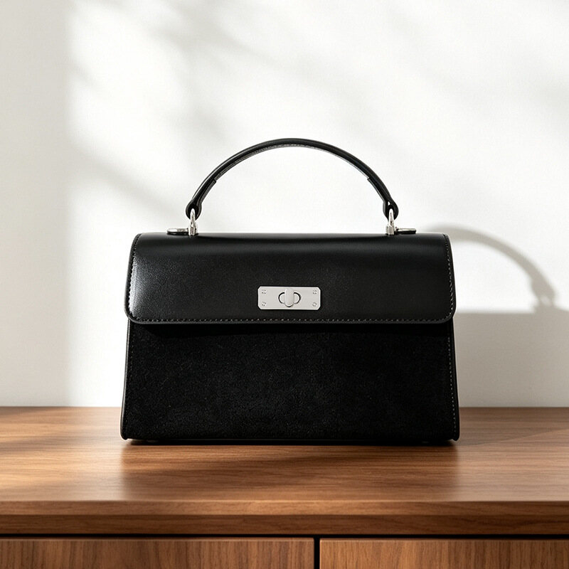 Trendy, minimalist commuter bag with a Korean-inspired luxury aesthetic. Stylish small square bag featuring vintage design and versatile styling for hand or crossbody carry.