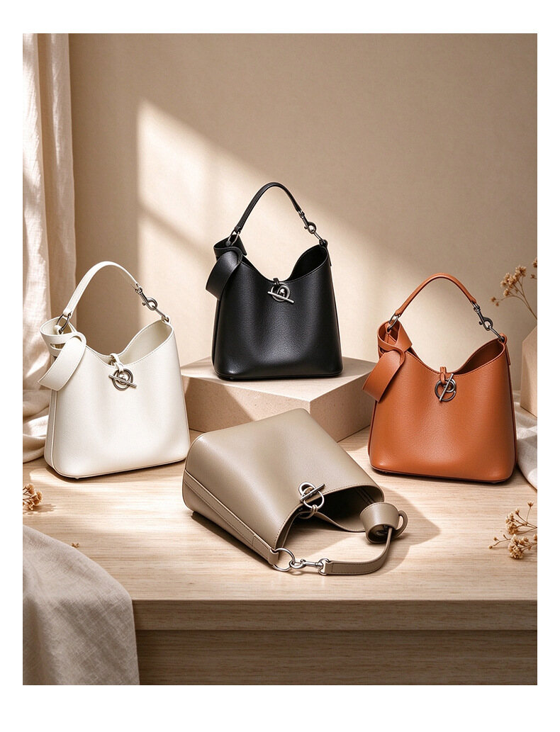 New Arrival: B-Style Genuine Leather Bucket Bag with Ring Detail. Premium Full-Grain Natural Cowhide, High-End Trendy Crossbody for Women.