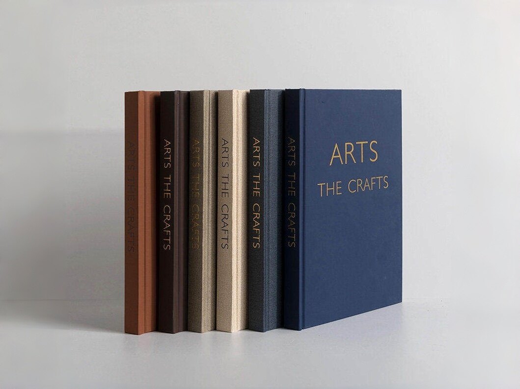 Gold-embossed fabric-texture prop book