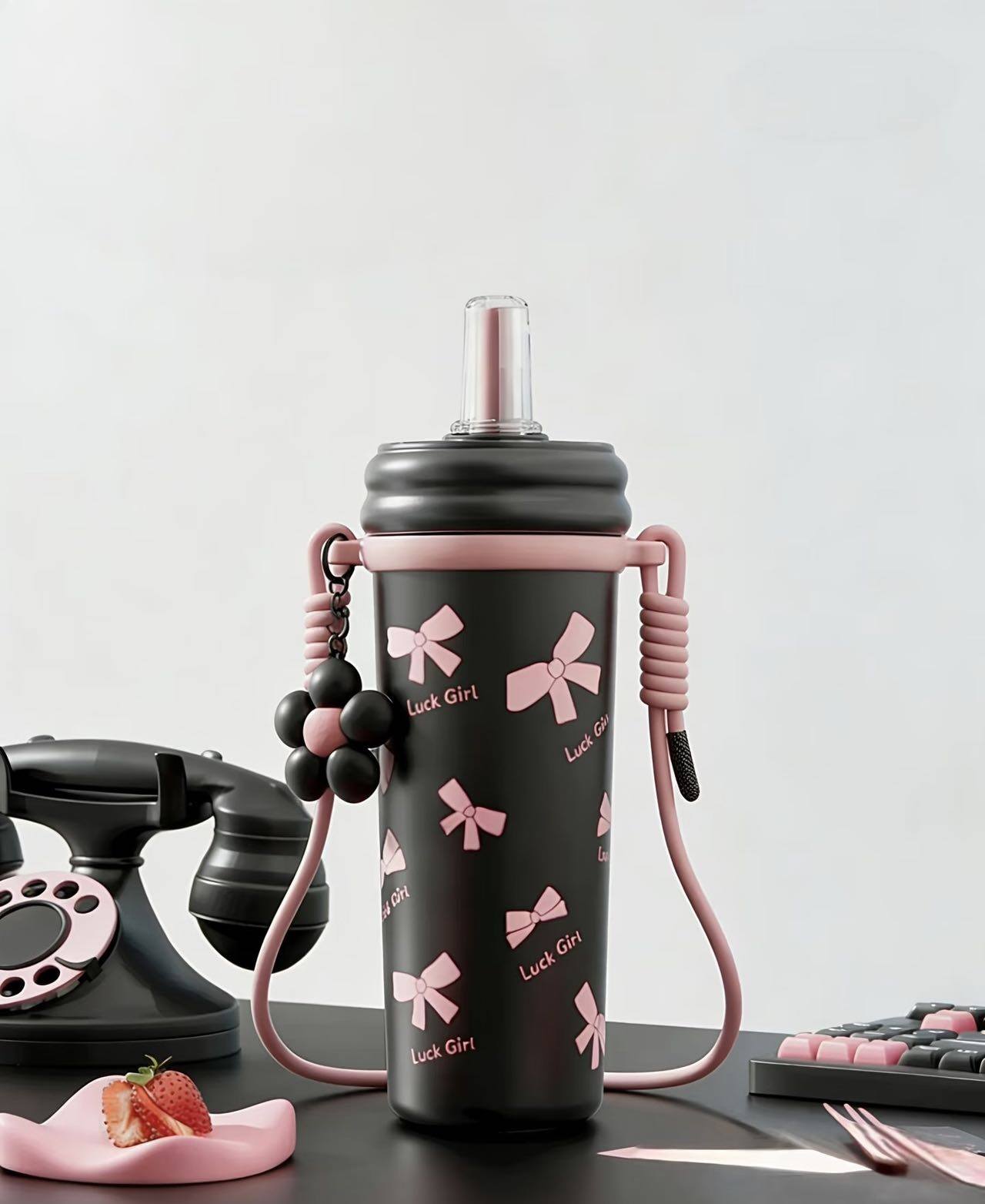 Bow-adorned insulated tumbler