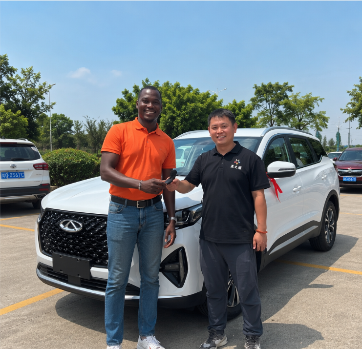 Happy customer receiving vehicle