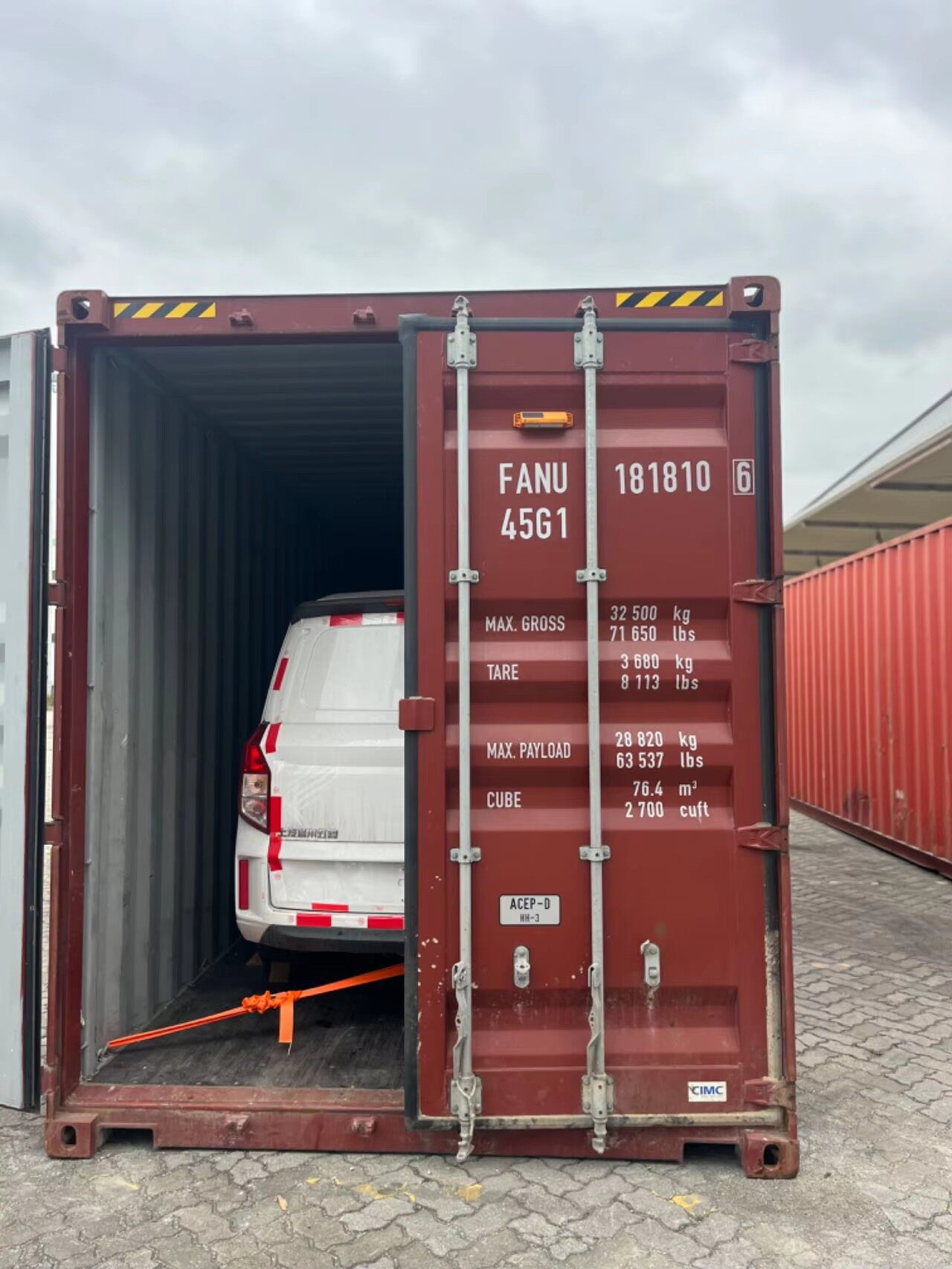 Container with vehicle ready for shipping