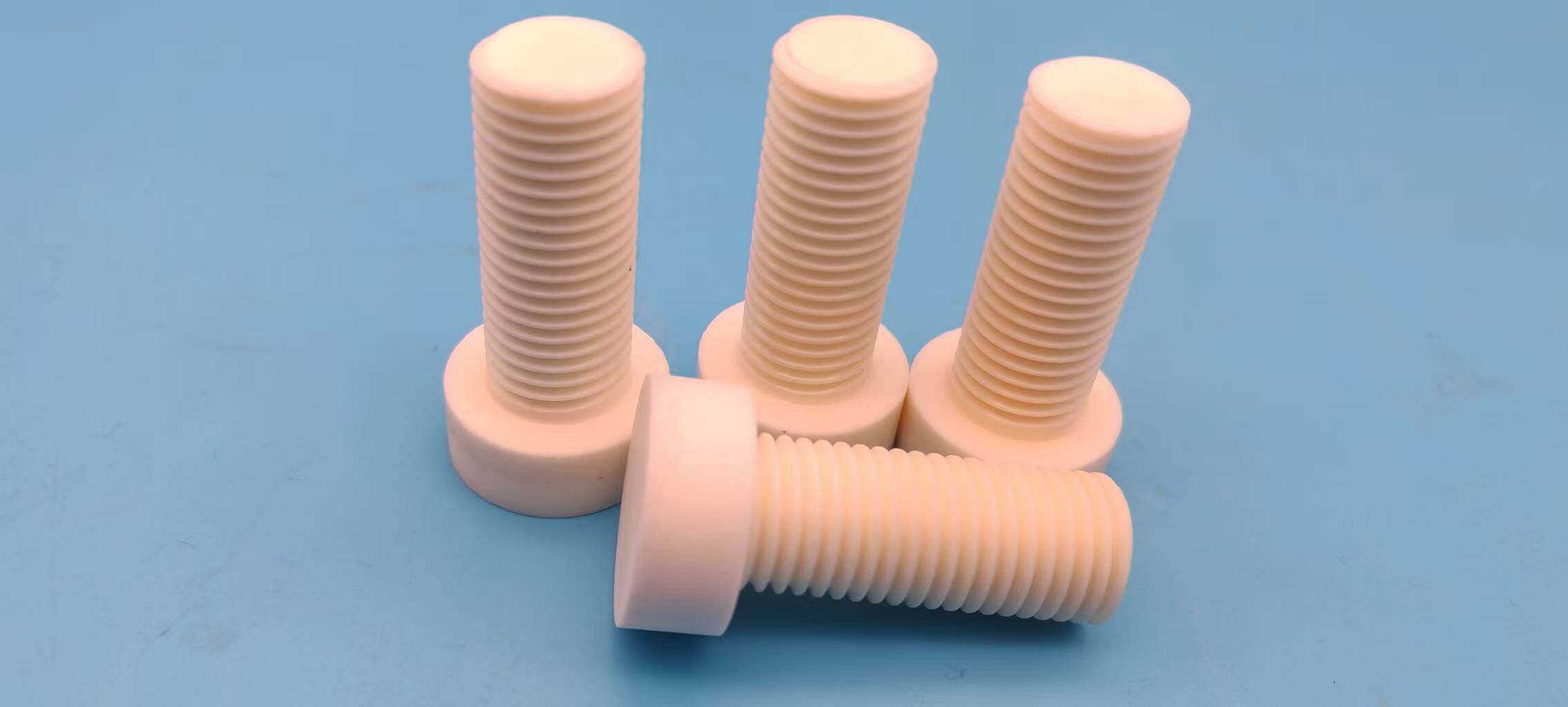 Aluminum nitride ceramic bolts and threaded fasteners