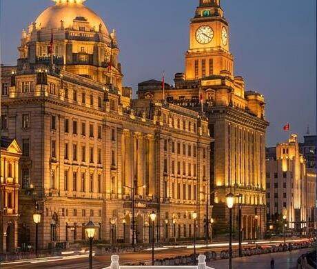 Historic Bund waterfront buildings illuminated at dusk, Shanghai