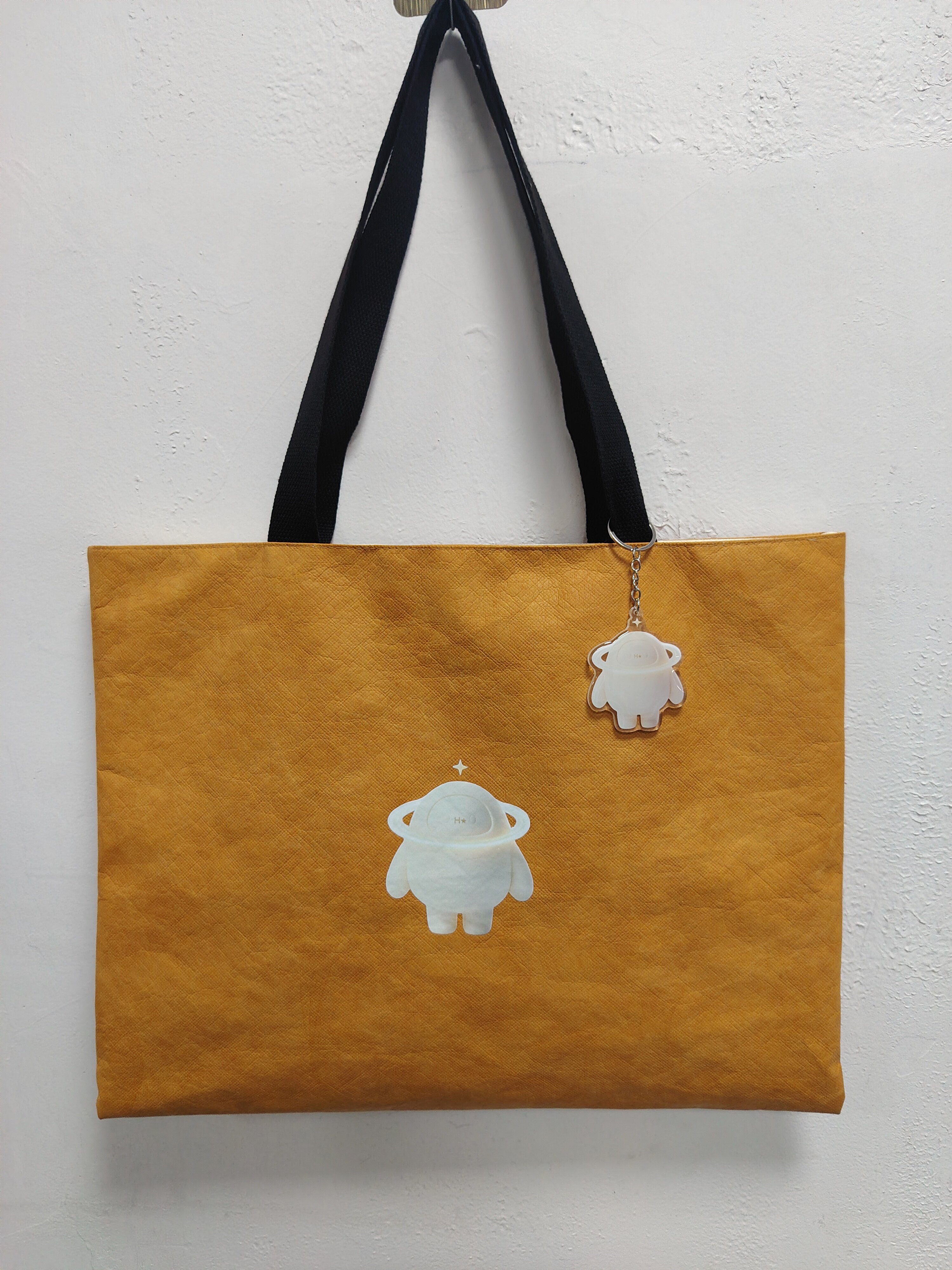 Tyvek bag + acrylic charm