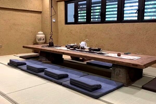 泥度会所茶室项目中的材质对话