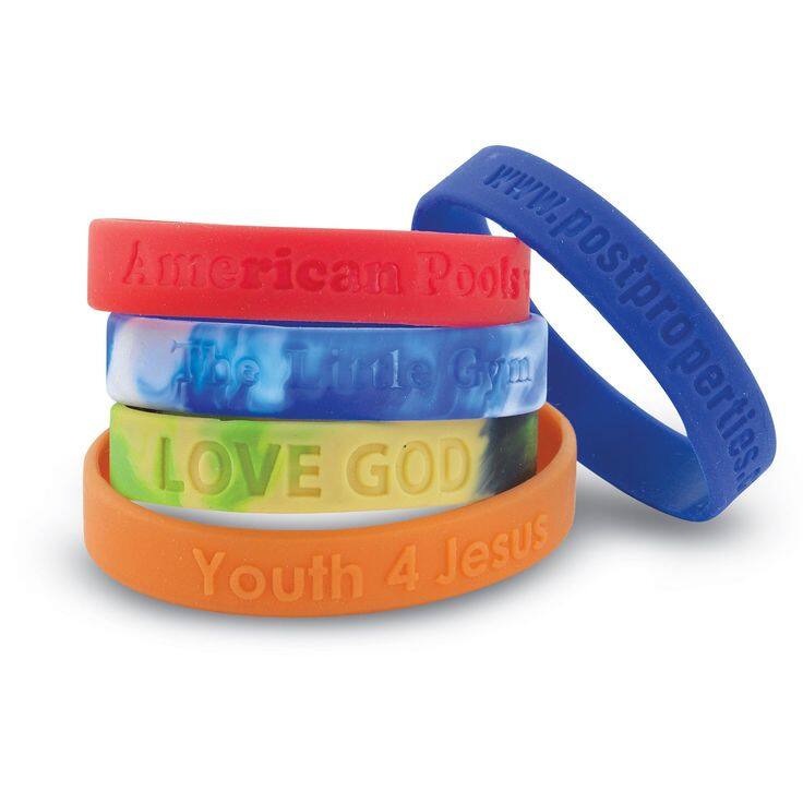 Stacked debossed silicone bracelets printed with organization names and messages