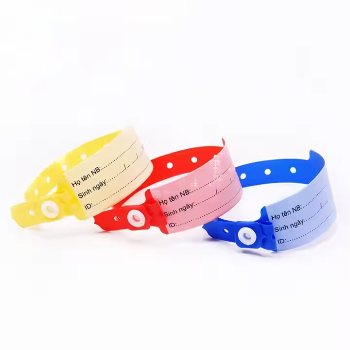 Yellow, red and blue looped patient identification wristbands with snap clip closures