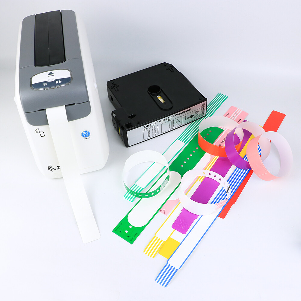 Thermal wristband printer with Z-Band cartridge and colorful printed wristband samples