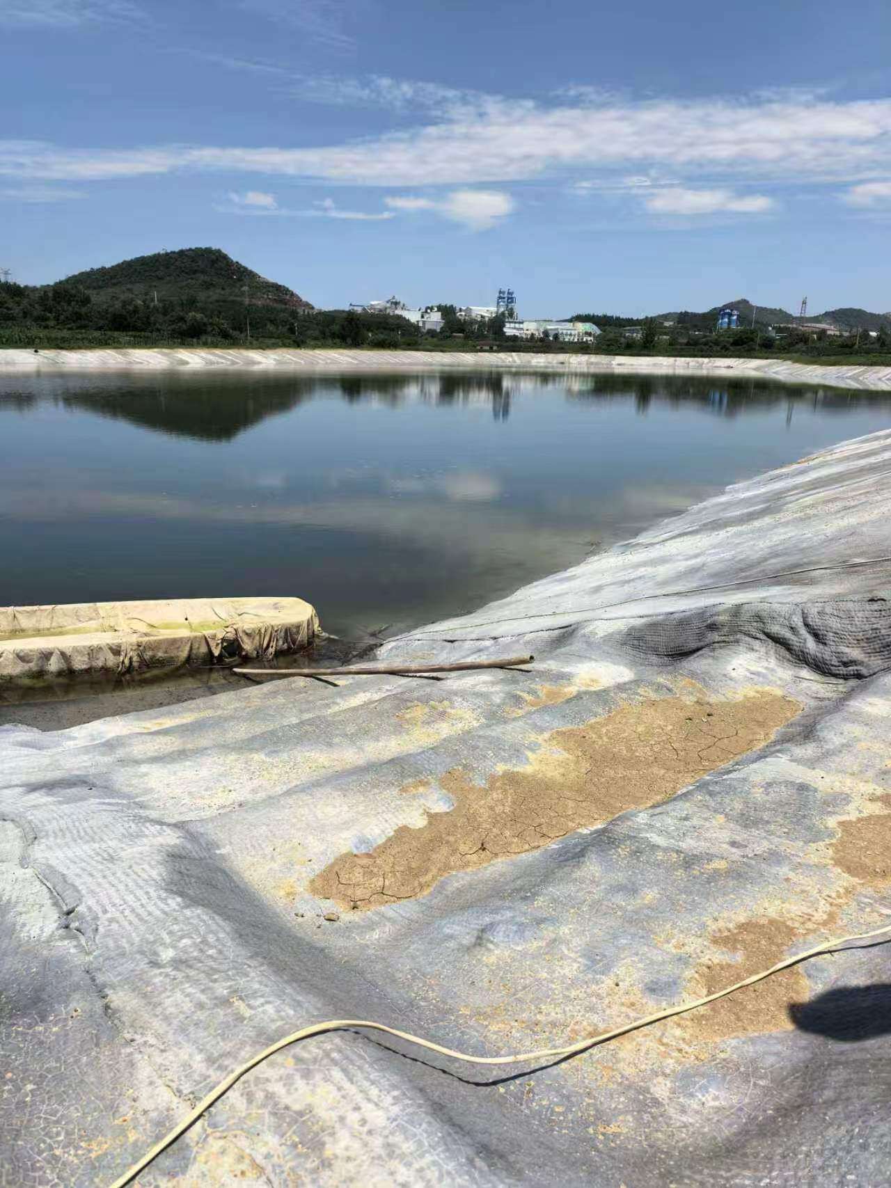 湖北玖坤 JC/T2884 水泥毯，湖北大面积养殖塘回访，露天抗老化寿命久
