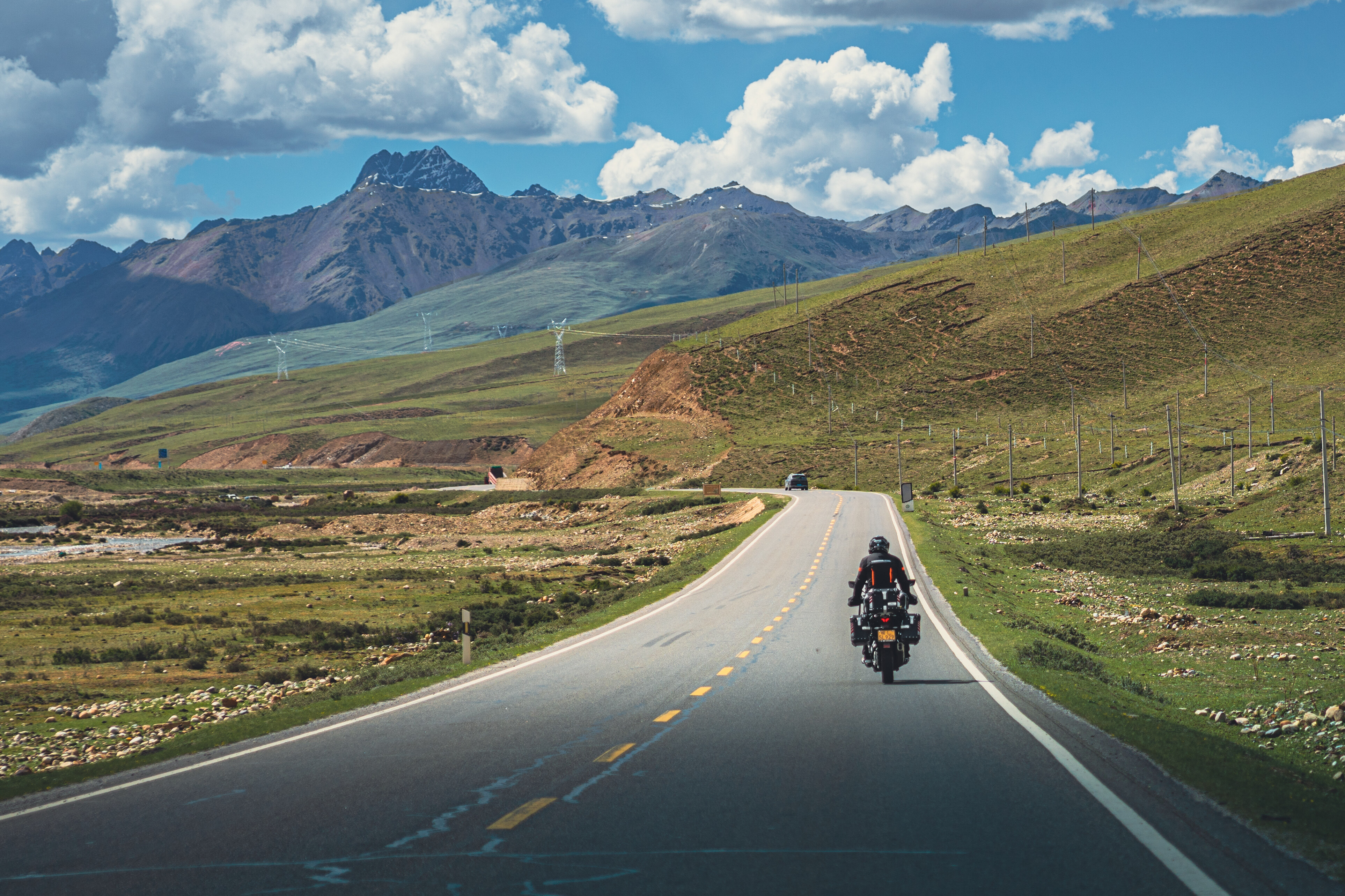 Plateau Highway ยท Distant Snow Mountains