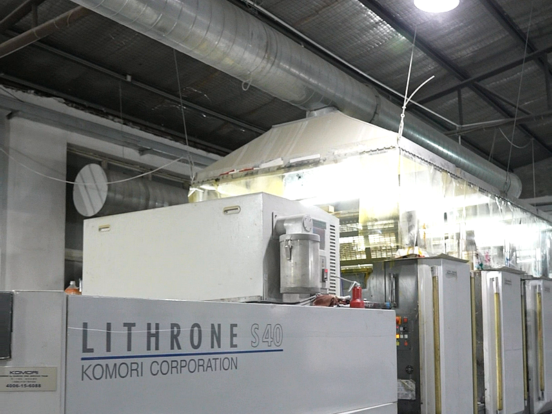 Packaging factory machine operation by skilled worker