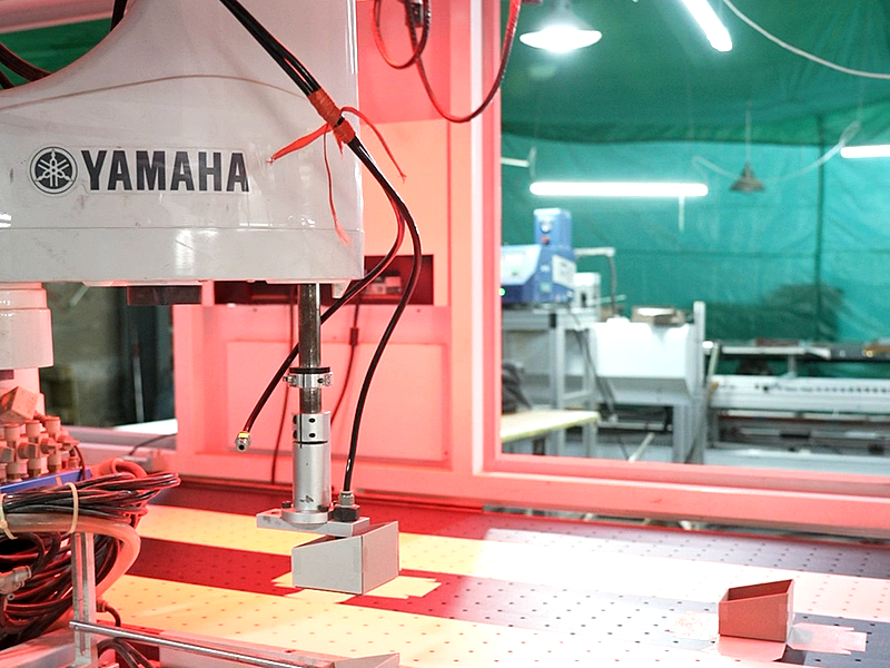 Automatic packaging production machine for paper packaging