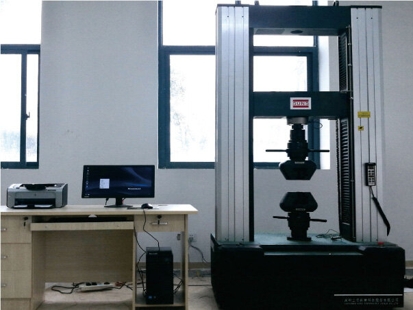 Hardness and impact testing machine in a metallurgical laboratory
