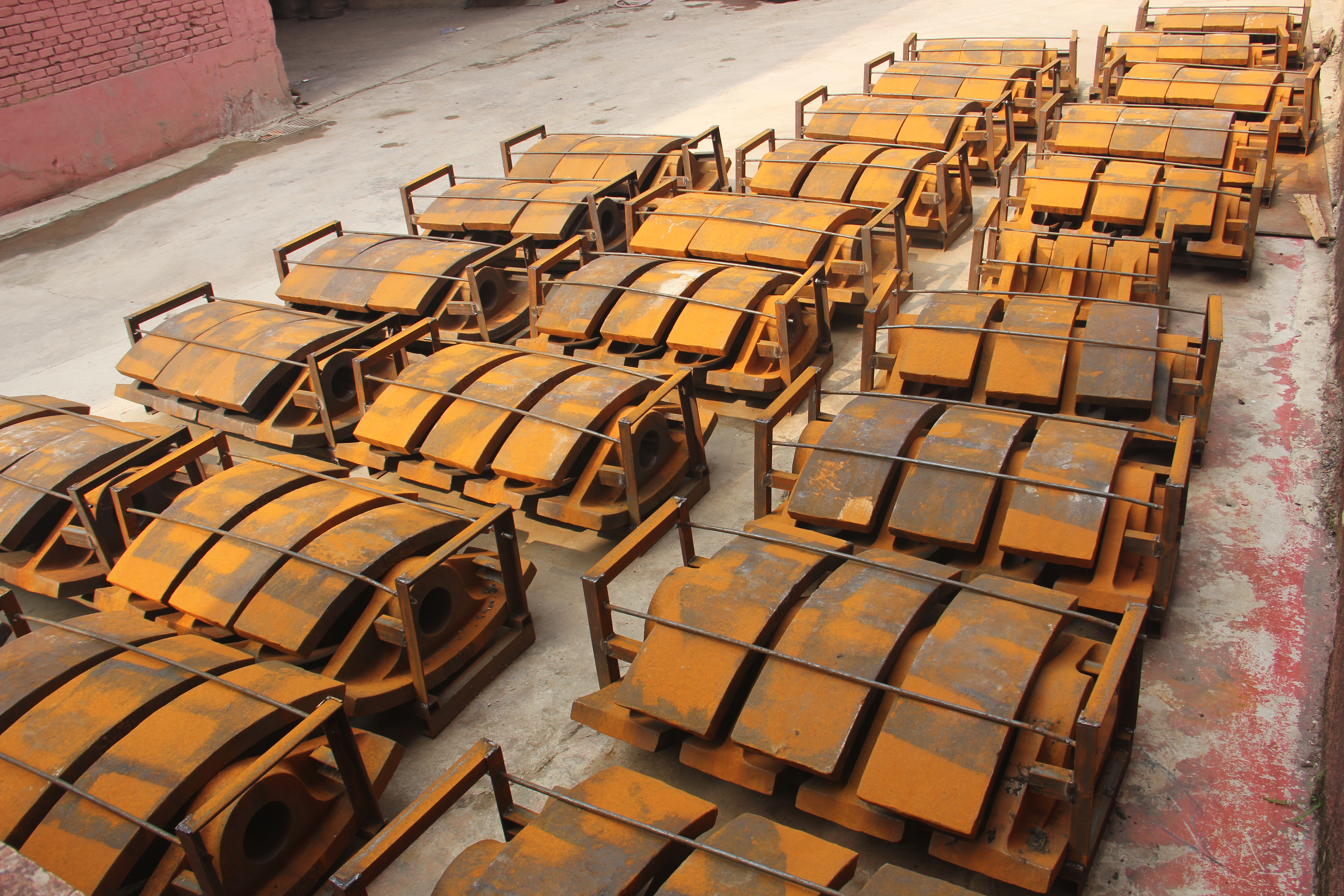 Shredder hammers and wear parts in an industrial workshop