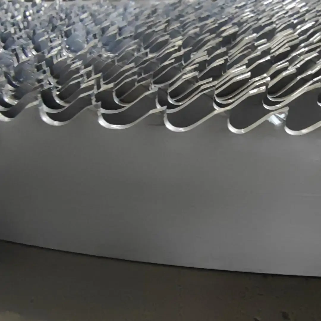 Carbide-tipped bandsaw blade 67 mm cutting a steel billet