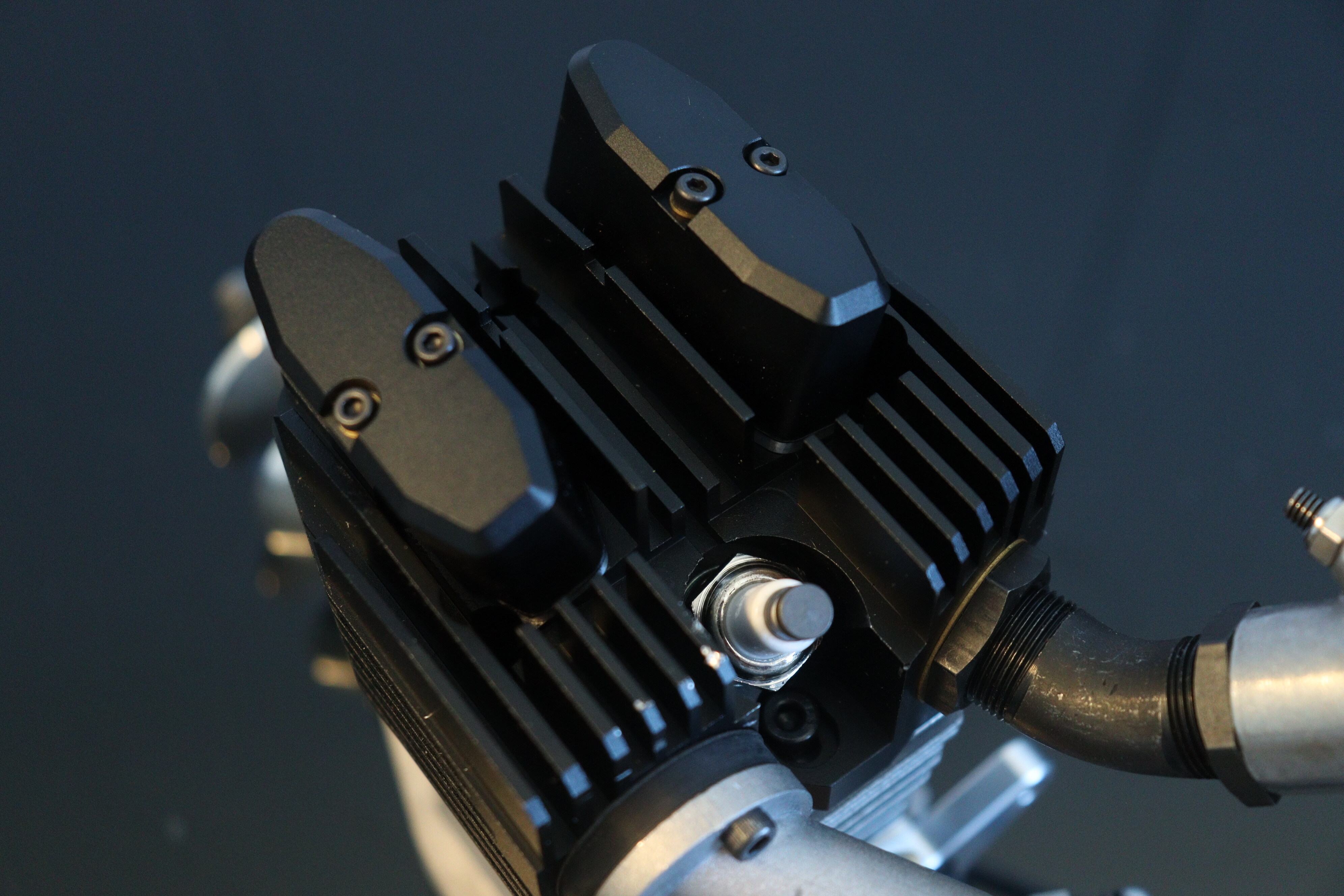 Close-up of the cylinder head and spark plug top