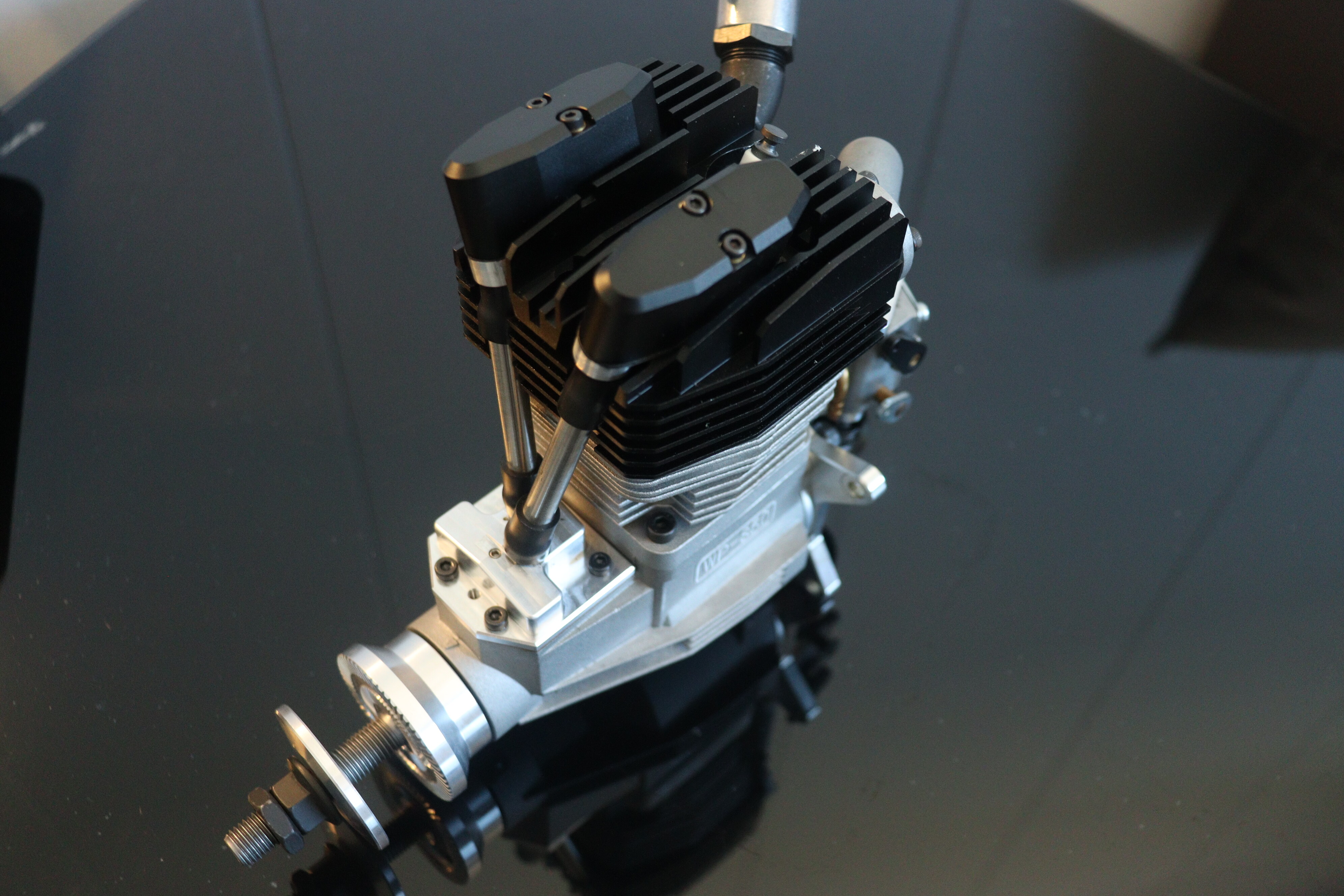 Dual-cylinder cylinder head and ignition wire routing