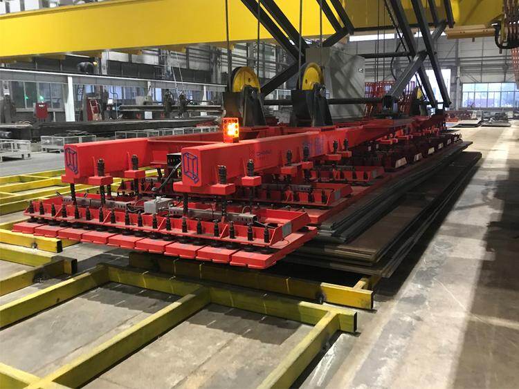 Electro-Permanent Magnetic Lifting for Faster and Safer Laser Cutting