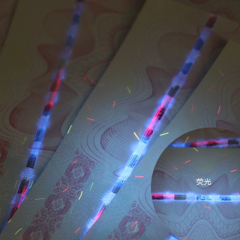 UV-reactive fiber security paper