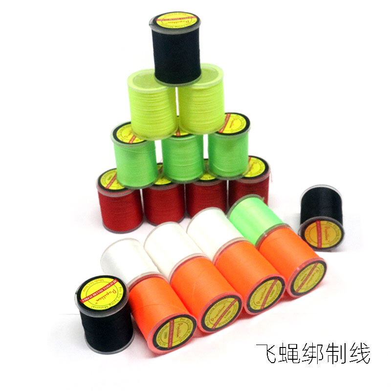 Papillon 鱼钩专用绑制线卷轴特写,展示高强度与鲜艳色泽